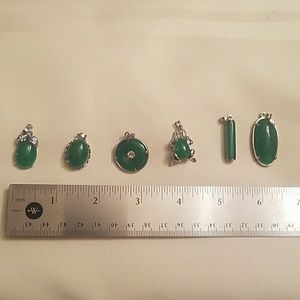 Lot of 7 jade and silver tone pendants